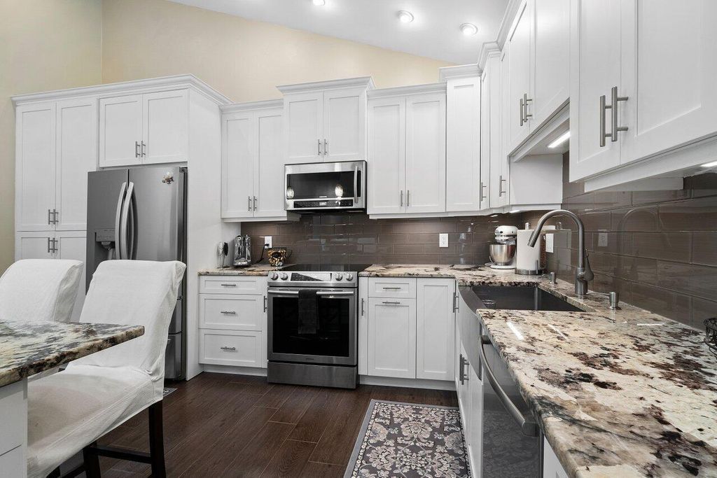 Photo of 12800 Woodmill Drive, Palm Beach Gardens, FL 33418 (MLS # R10908627)