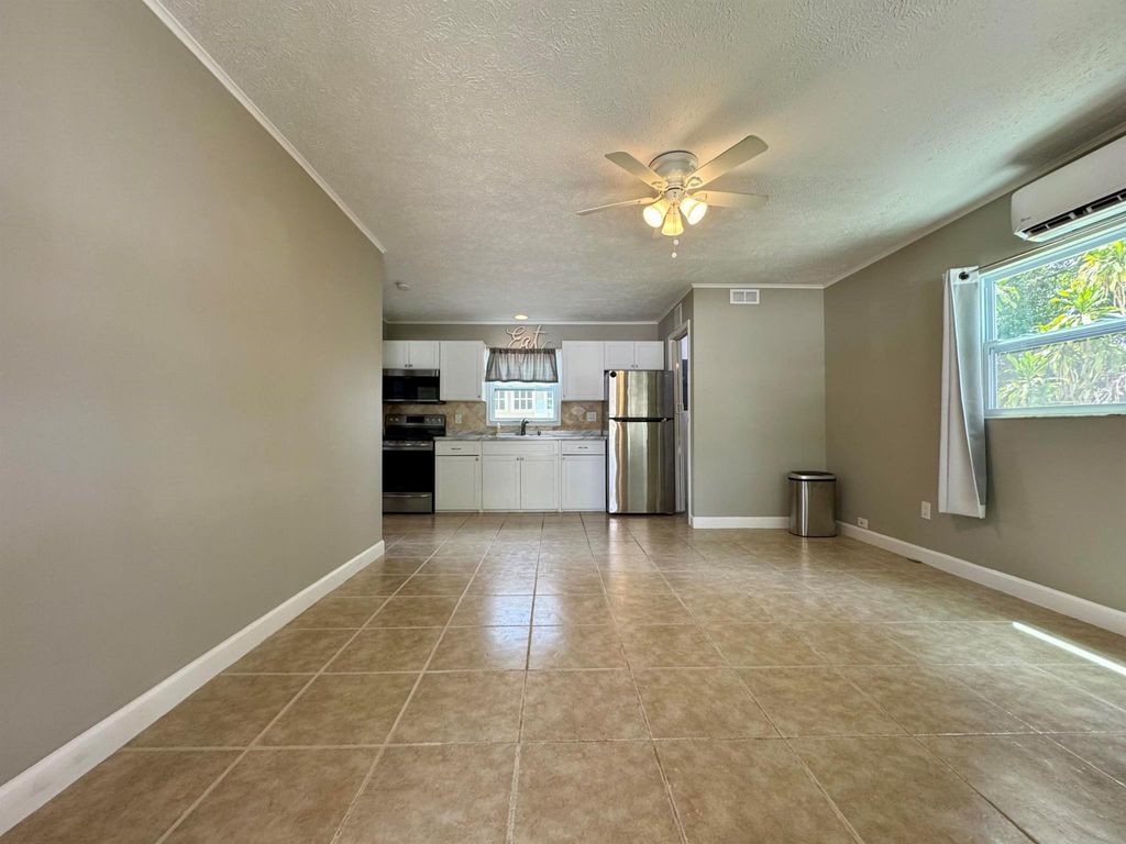Photo of 1112 NE Stuart Street #C, Jensen Beach, FL 34957 (MLS # R11119771)