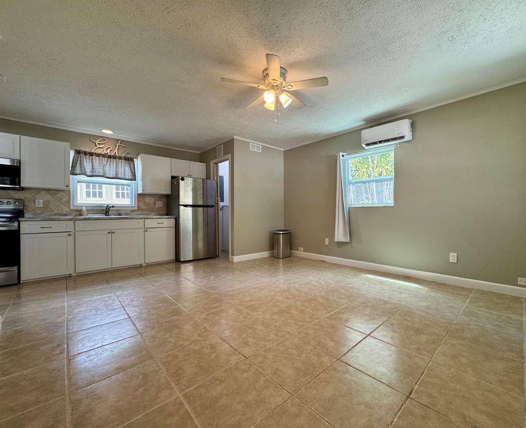 Photo of 1112 NE Stuart Street #C, Jensen Beach, FL 34957 (MLS # R11119771)