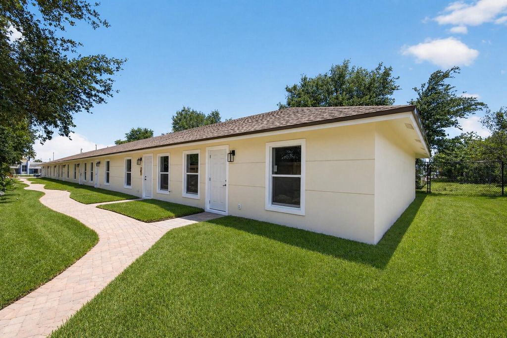 Photo of 3255 Avenue J, Riviera Beach, FL 33404 (MLS # B26022077)