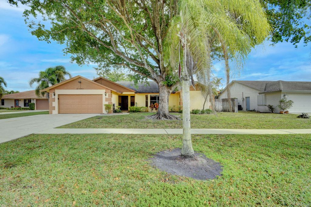 Photo of 6090 Birch Tree Terrace Ter, Lake Worth Beach, FL 33467 (MLS # R10771114)