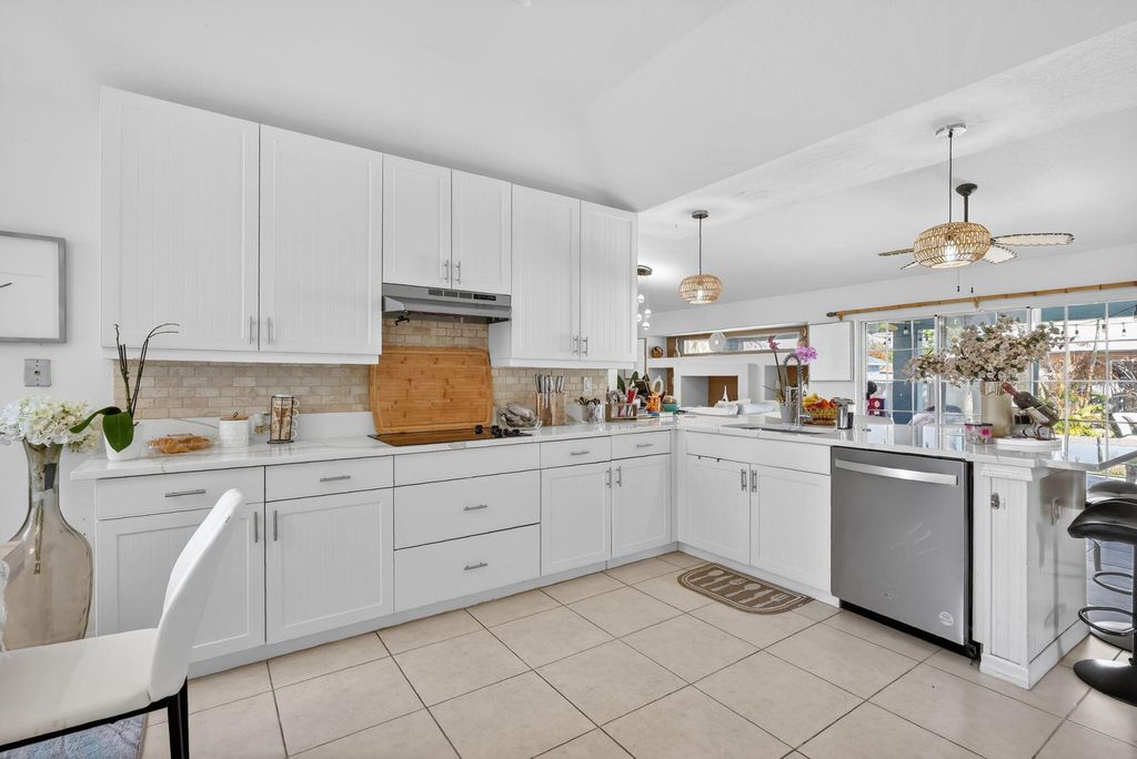 Photo of 1465 SW Flounder Lane, Port Saint Lucie, FL 34953 (MLS # R11163645)