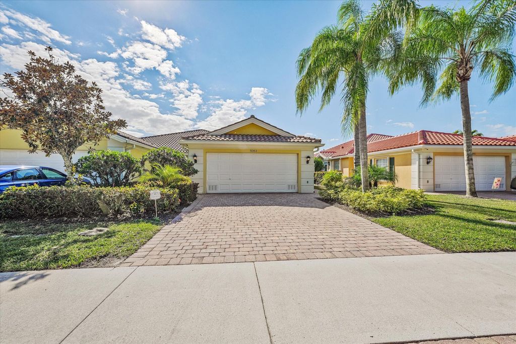 Photo of 5063 Magnolia Bay Circle, Palm Beach Gardens, FL 33418 (MLS # R11159495)