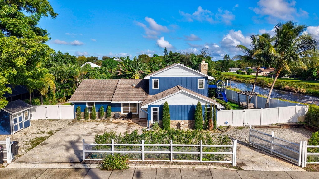 Photo of 9220 LAWRENCE Road, Boynton Beach, FL 33436 (MLS # B26094632)