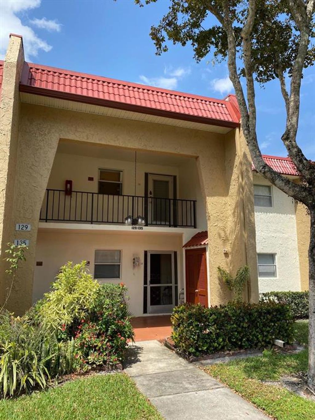 Photo of 129 Lake Evelyn Drive, West Palm Beach, FL 33411 (MLS # R10703411)