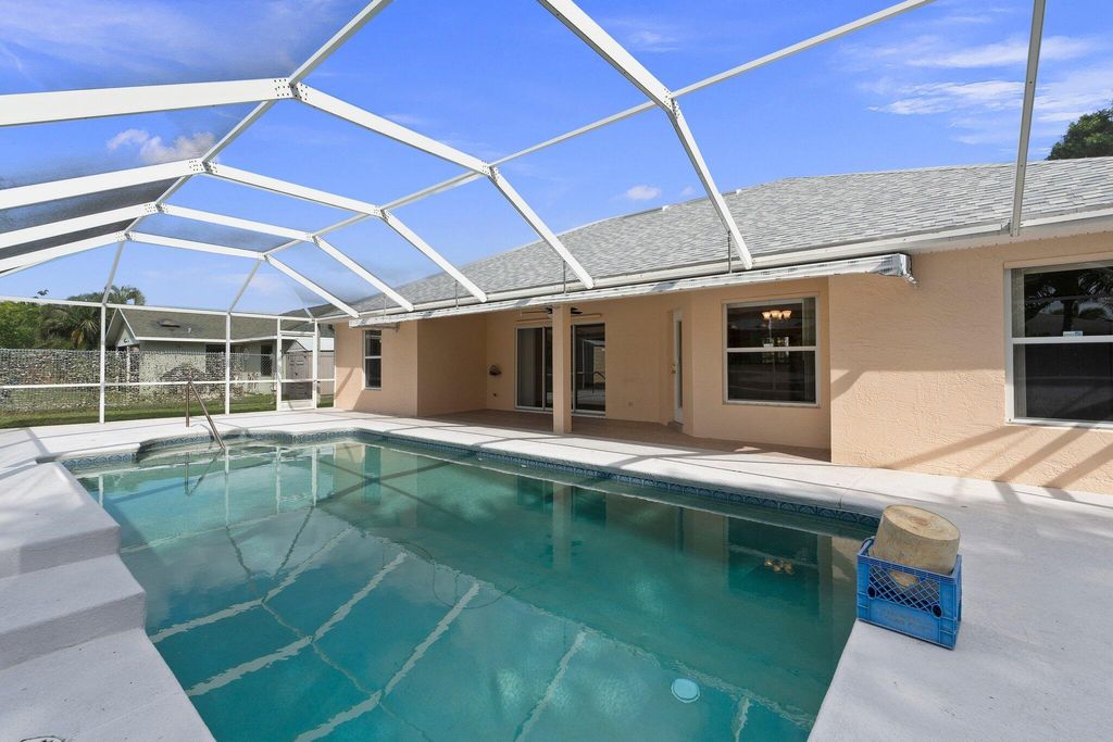 Photo of 2466 SE Renick Avenue, Port Saint Lucie, FL 34952 (MLS # R10972814)