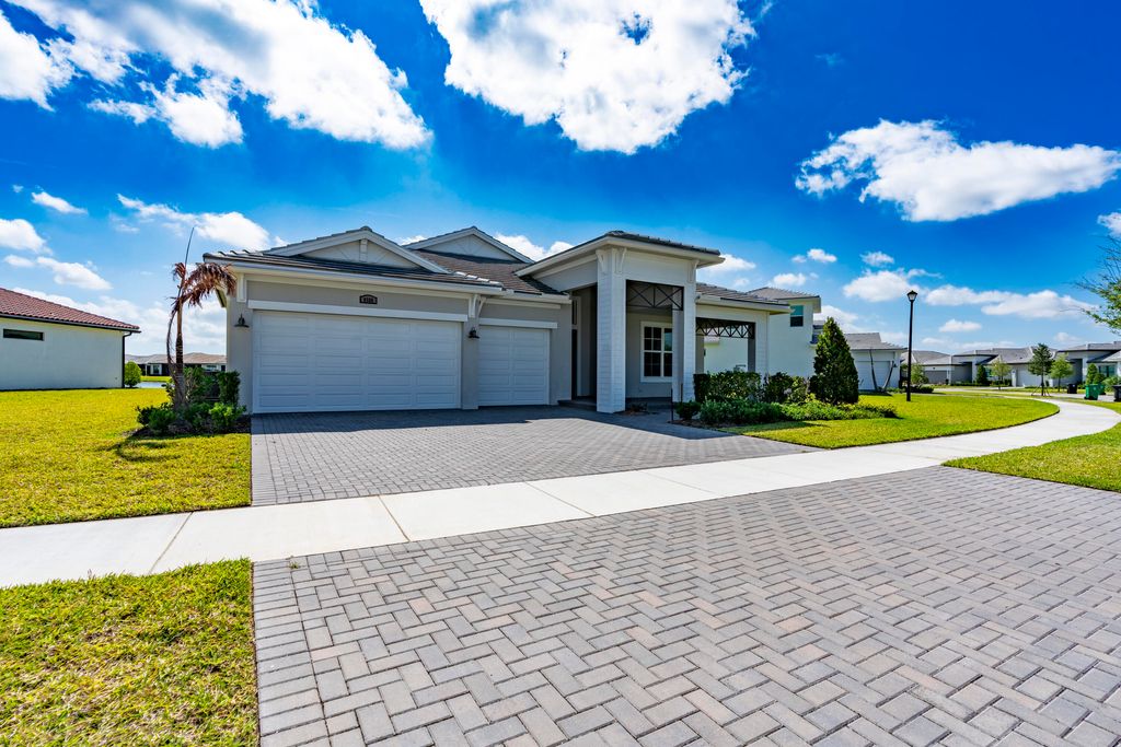 Photo of 8580 SW Cantante Way, Port Saint Lucie, FL 34987 (MLS # B26027063)