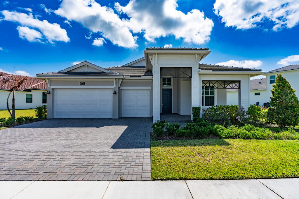 Photo of 8580 SW Cantante Way, Port Saint Lucie, FL 34987 (MLS # B26027063)