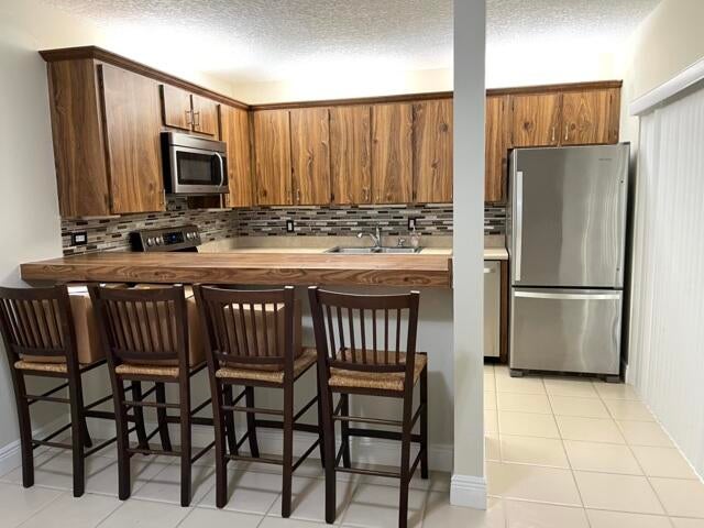 Photo of 2507 25th Lane, Palm Beach Gardens, FL 33418 (MLS # R11114188)