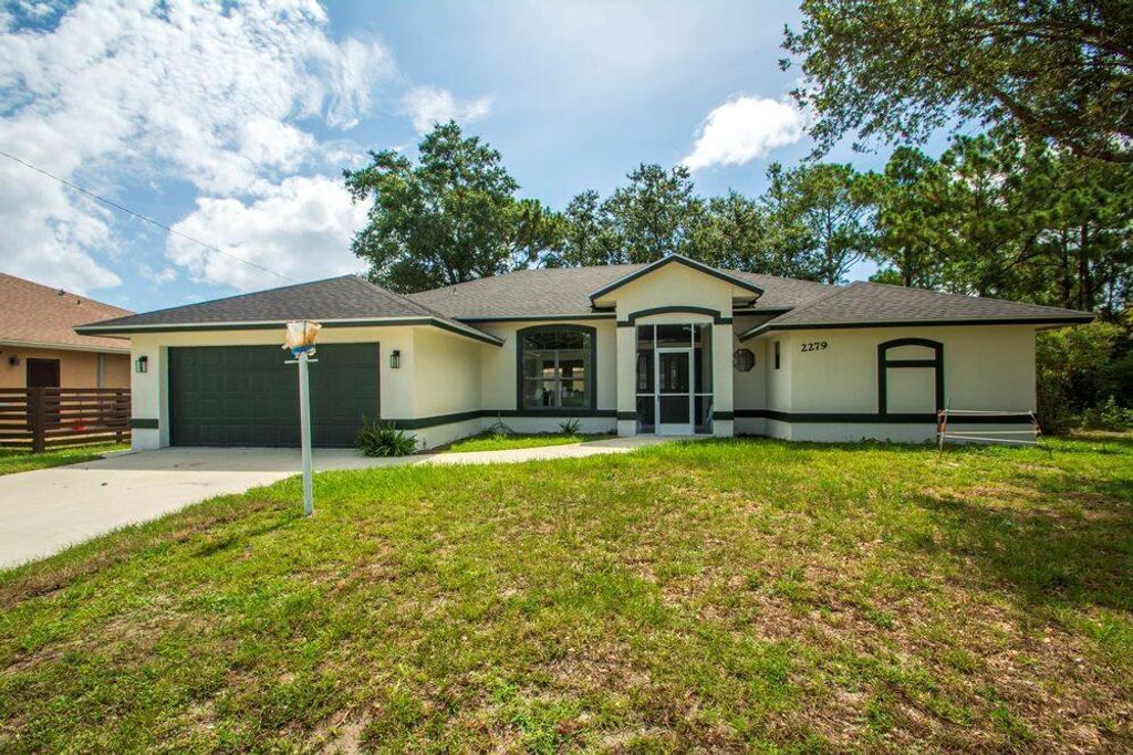 Photo of 2279 SW Franklin Street St, Port St Lucie, FL 34953 (MLS # R10815327)