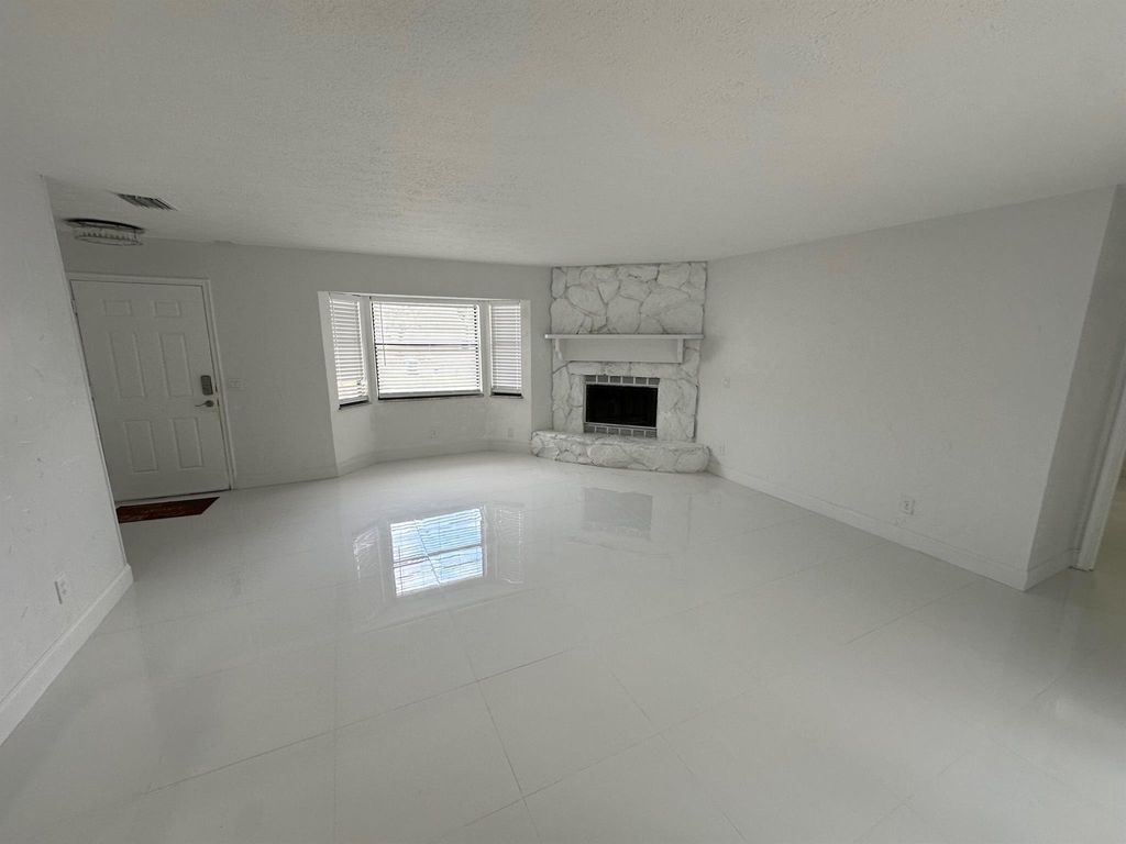 Photo of 1242 SW Parma Avenue, Port Saint Lucie, FL 34953 (MLS # R10953045)