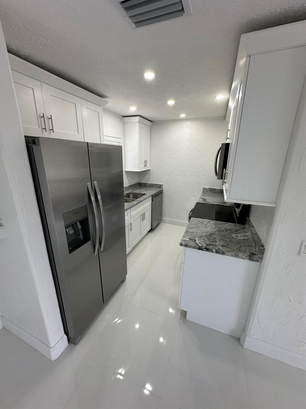 Photo of 1242 SW Parma Avenue, Port Saint Lucie, FL 34953 (MLS # R10953045)