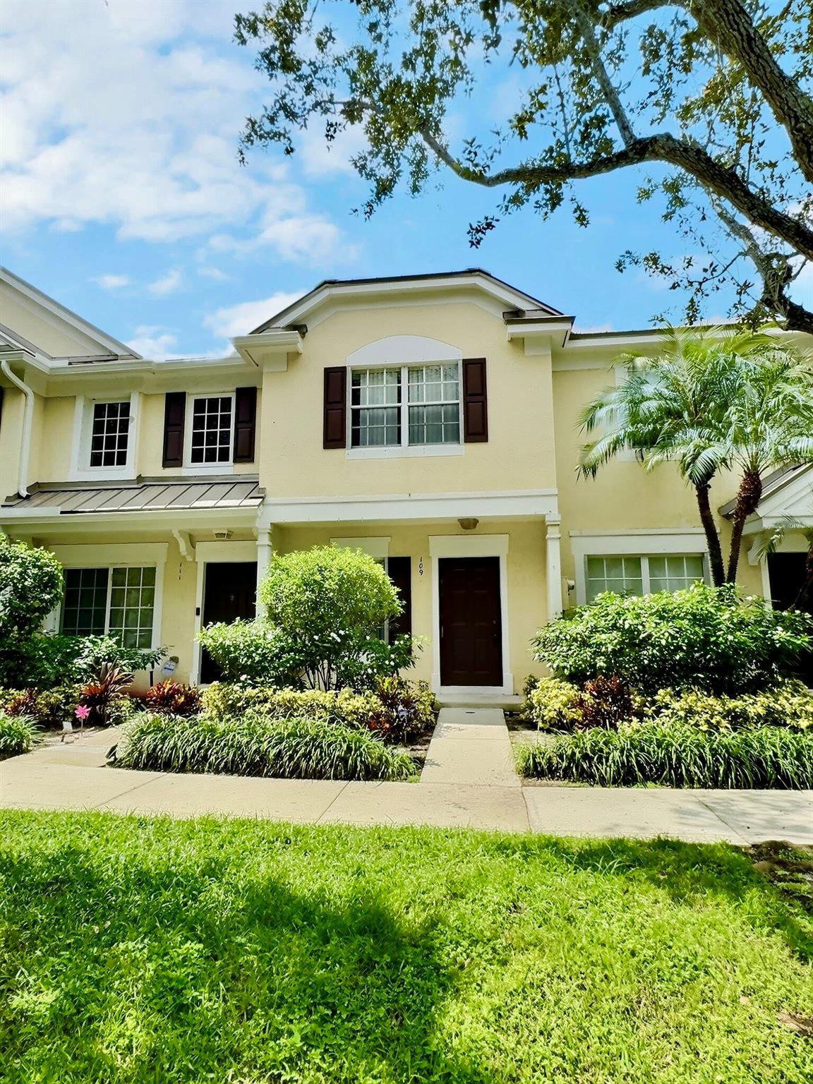 Welcome home to this cozy 2-bedroom, 2.5-bathroom townhouse in the desirable community of Somerset in West Plantation. This charming residence featuring a spacious layout with tile flooring throughout the main level and wood plank flooring upstairs. Each bedroom comes with its own en-suite bathroom, and a half bath on the main floor perfect for guests. The home also has a washer and dryer and extra storage for added ease. Enjoy your screened in patio with peaceful lake views. The family-friendly community offers a pool, ample guest parking, and a welcoming neighborhood atmosphere. Located just minutes from Plantation Walk, Broward Mall, restaurants, shops, and easy access to major highways, this townhouse blends modern living with unbeatable convenience. Pets ok with approval