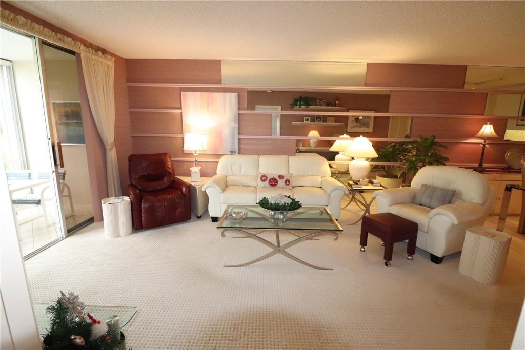 Photo of 3503 Oaks Way #108, Pompano Beach, FL 33069 (MLS # F10413296)