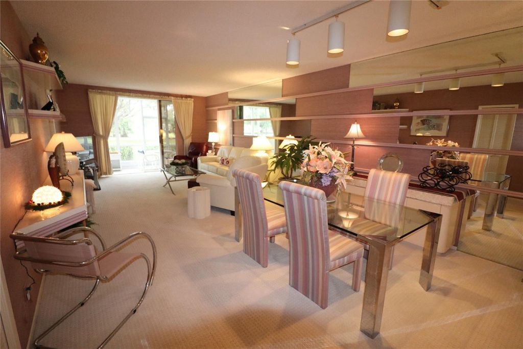 Photo of 3503 Oaks Way #108, Pompano Beach, FL 33069 (MLS # F10413296)