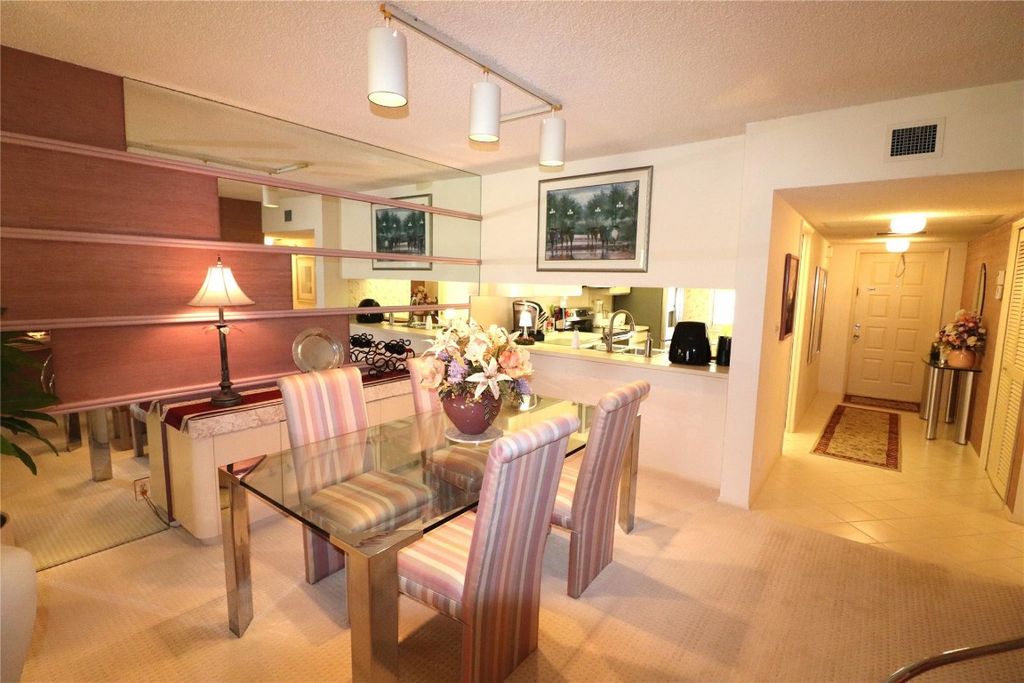Photo of 3503 Oaks Way #108, Pompano Beach, FL 33069 (MLS # F10413296)