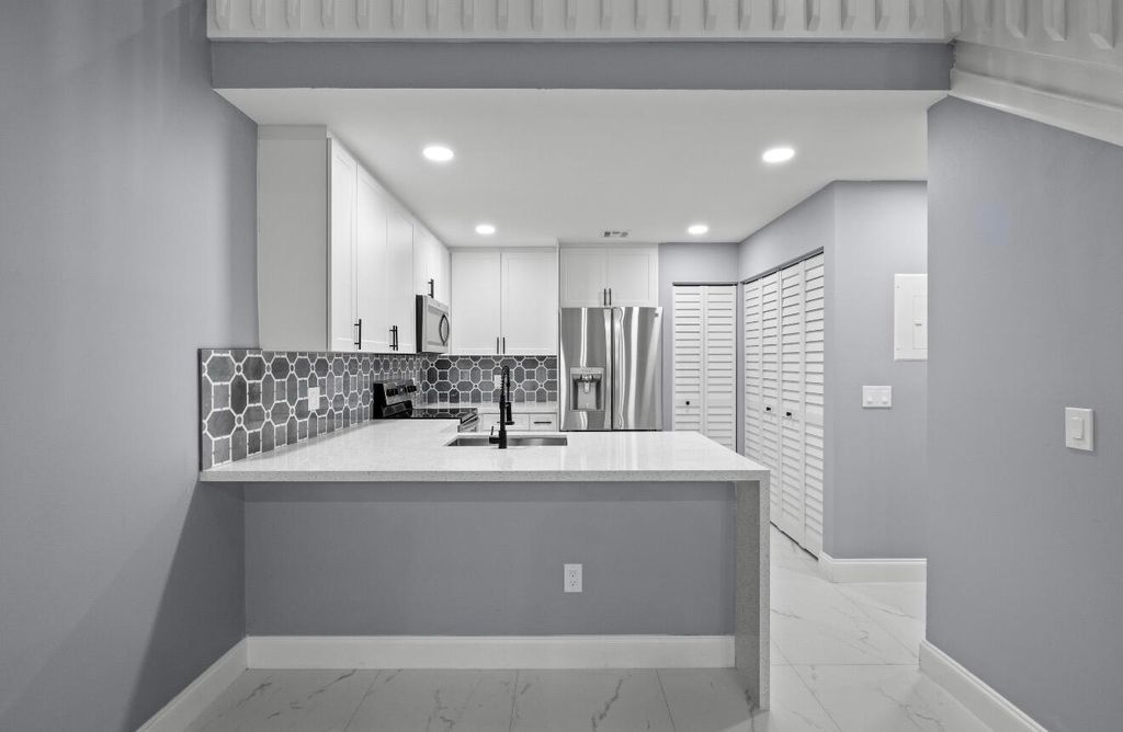 Photo of 7125 Sportsman Drive, North Lauderdale, FL 33068 (MLS # B26029254)