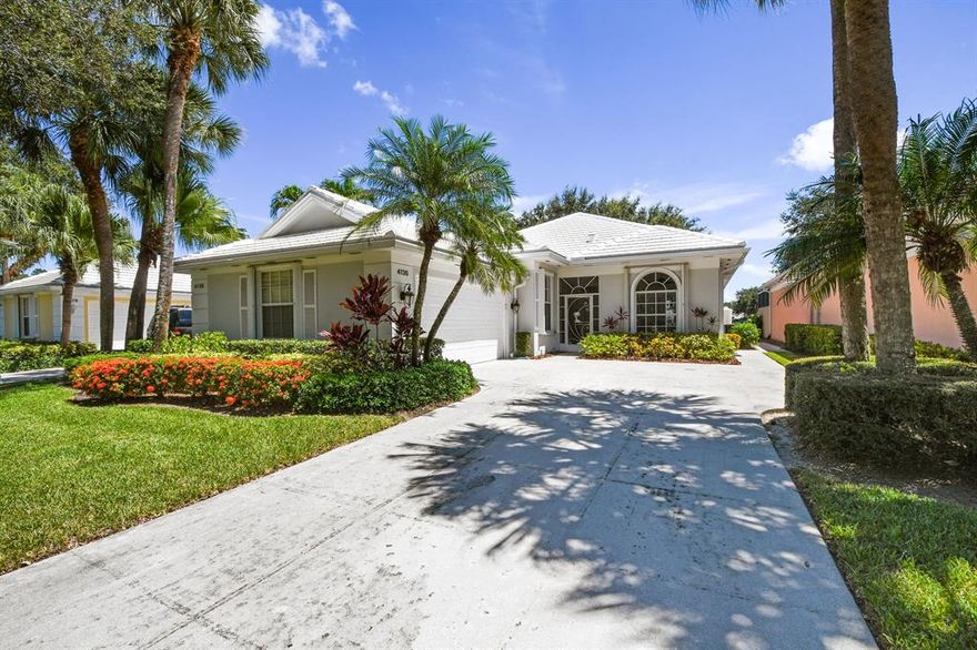 Welcome home to this beautifully remodeled 3 bed 2.1 bath plus a den Carmel model with a gorgeous lake view. This Divosta built home is perfect for entertaining your friends and family with an open floor plan. When you walk in you will immediately notice the engineered black walnut wood floors. The renovated  kitchen has Cambria Quartz counters, SS Appl, soft close drawers and cabinets with pull outs. From most rooms you will enjoy a panoramic view of the lake as well as your solar heated resurfaced salt pool with a variable speed pump.The decking has an acrylic concrete finish. The roof is new as of 2014.  The attic has been floored and a solar attic fan is in place for energy efficiency. No detail has been overlooked in this home. The location is perfect with easy access to the beach shopping, restaurants, PBI airport, I-95 and the turnpike.