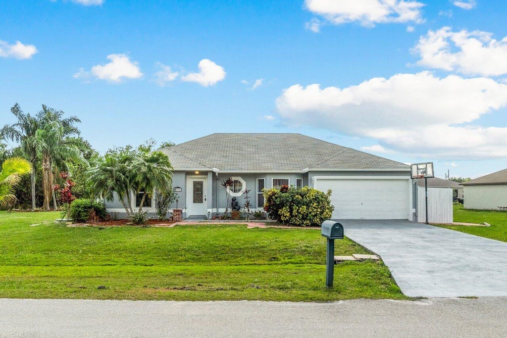 Photo of 5295 NW Lovett Circle, Port Saint Lucie, FL 34986 (MLS # R10789912)