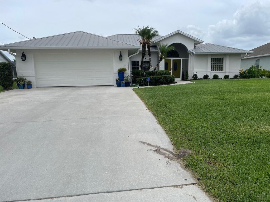 Photo of 1618 SW Lexington Drive, Port Saint Lucie, FL 34953 (MLS # B26013995)