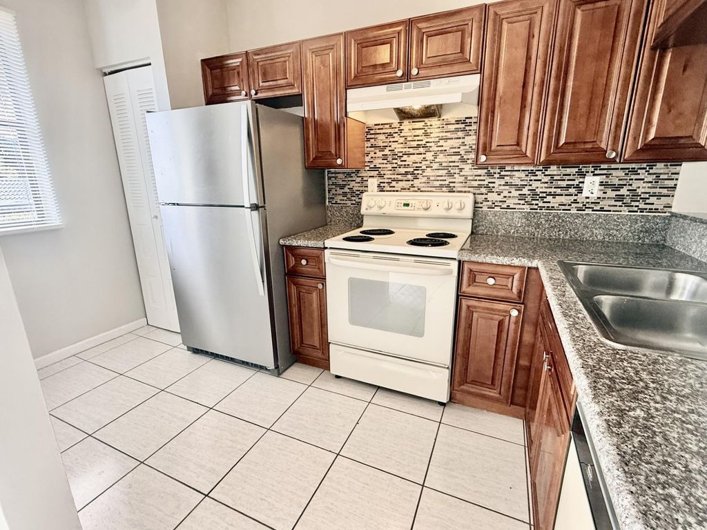 Photo of 11652 NW 23rd Court, Coral Springs, FL 33065 (MLS # F10552365)