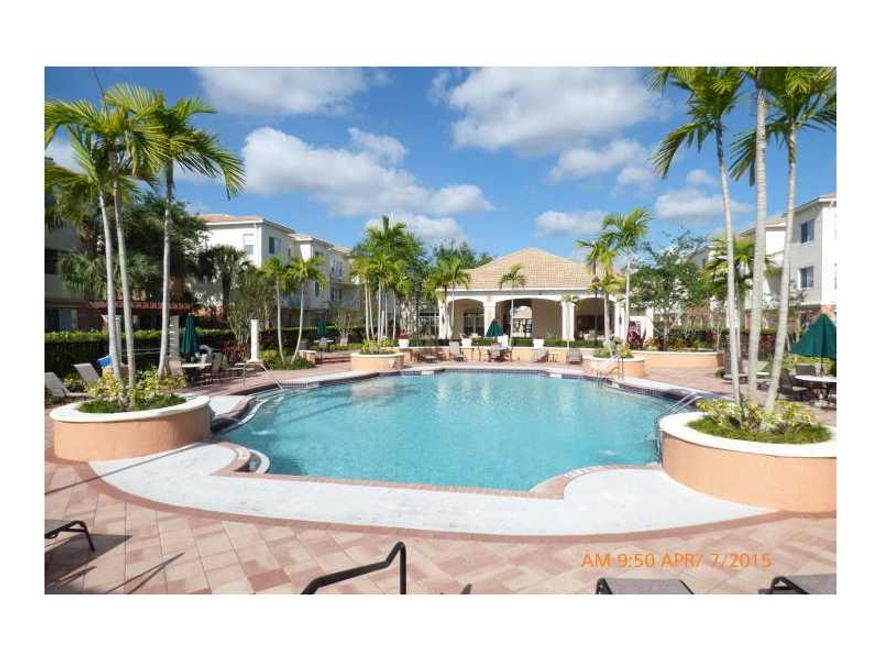 Clean and Beautiful, Special Open bright 3 bedroom in Mezzano! Resort style living awaits you in this gated community.    Super location is convenient to the Western Communities as well as West Palm Beach. This is a 2nd floor unit which has Hurricane Impa  ct windows. Large, well appointed baths and a gourmet open    concept kitchen. New tile! Hard to find Florida room in living area. Don't wait, this one    will move fast!  Garage may be rented separately for $140/month.