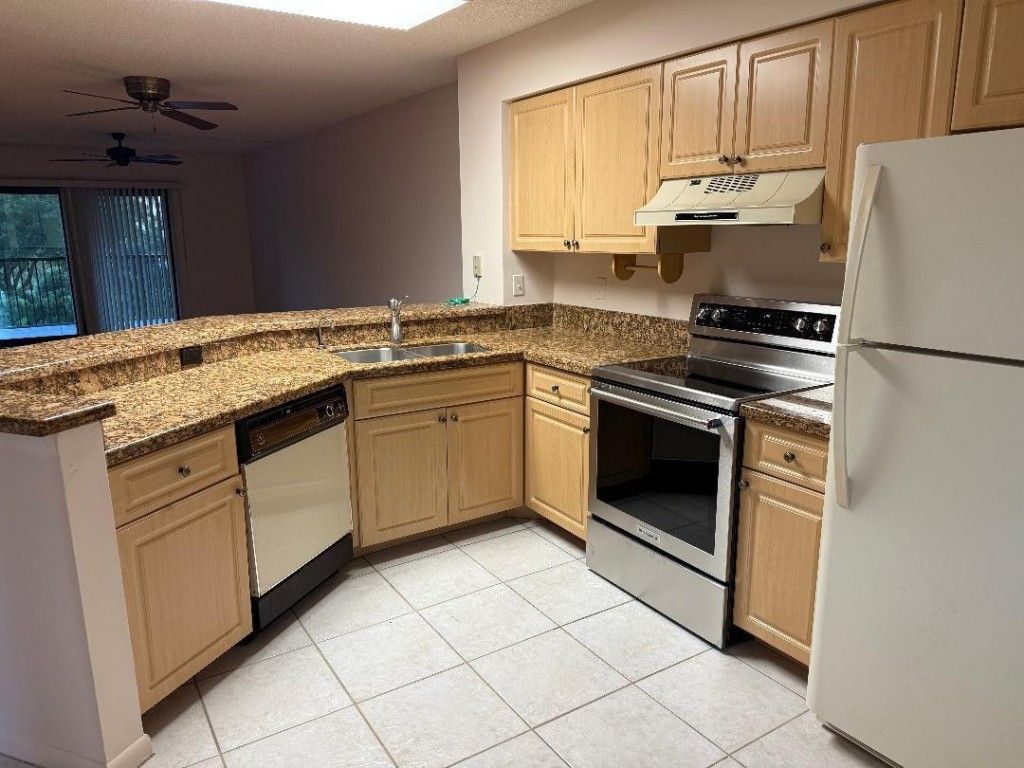Photo of 2205 S Cypress Bend Drive #307, Pompano Beach, FL 33069 (MLS # F10518679)