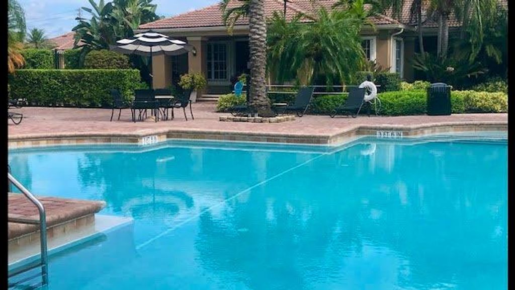 Photo of 3618 NW Mediterranean Lane #302, Jensen Beach, FL 34957 (MLS # R11029949)