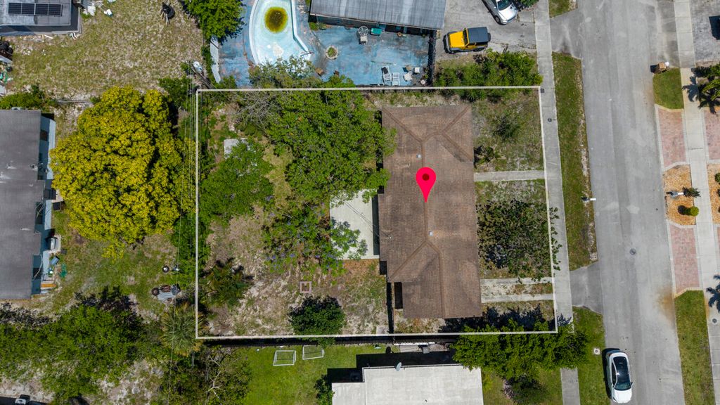Photo of 261 NE 42nd Street, Pompano Beach, FL 33064 (MLS # B26022629)