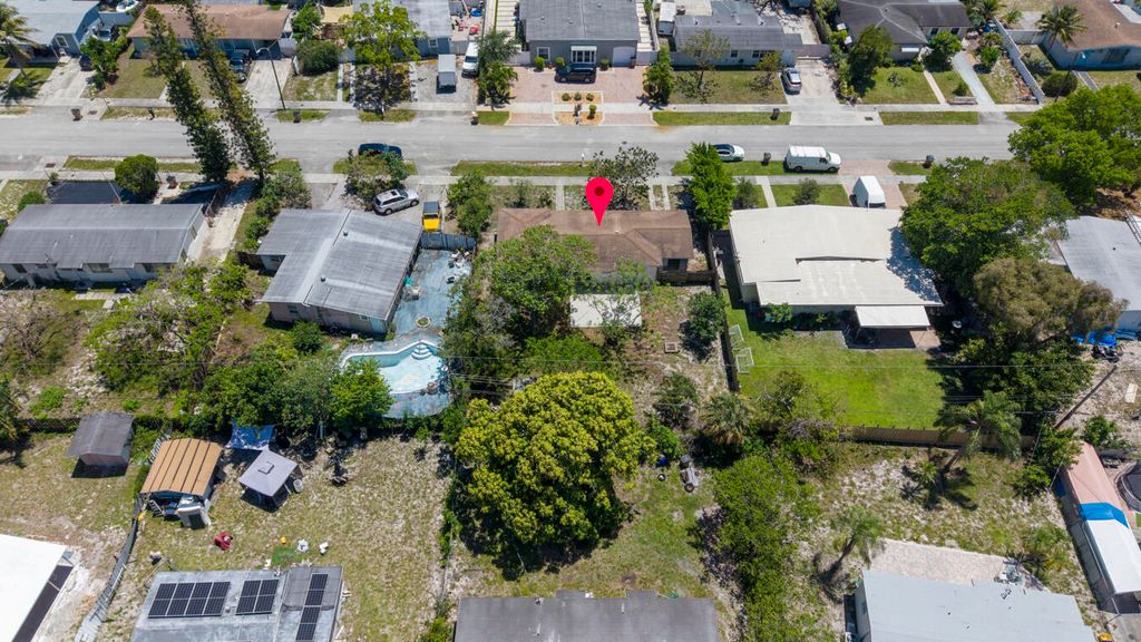 Photo of 261 NE 42nd Street, Pompano Beach, FL 33064 (MLS # B26022629)