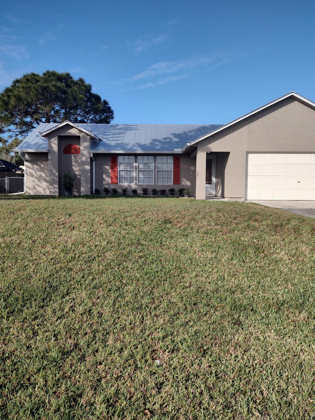 Photo of 343 SW Ridgecrest Drive, Port St Lucie, FL 34953 (MLS # R10898277)