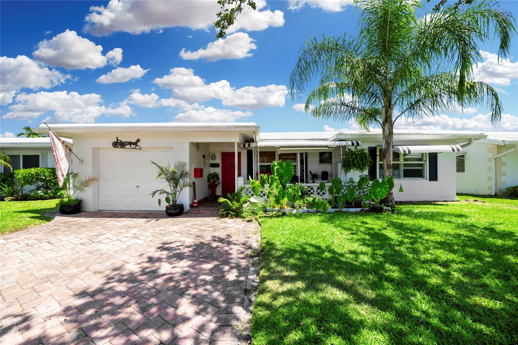 Welcome to this beautifully maintained single-family home, perfectly situated in the heart of the vibrant 55+ community of Leisureville. This spacious 2-bedroom, 2-bathroom residence offers an open floor plan filled with natural light, thanks to impact windows and doors throughout. Enjoy a large Florida room perfect for relaxing or entertaining, along with stylish tile and vinyl flooring, fresh neutral interior paint, and a 1-car garage. The home features an 8-year-old AC system and brand-new plumbing for added peace of mind. Leisureville offers low monthly association fees that include exterior painting, water and landscaping. Residents enjoy access to two clubhouses, swimming pools, a courtesy shuttle/bus service, and golf—everything you need for an active and carefree lifestyle.