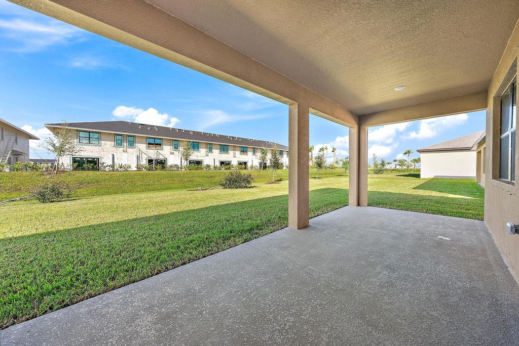 Photo of 9989 SW Triton Way, Port Saint Lucie, FL 34987 (MLS # R11034092)