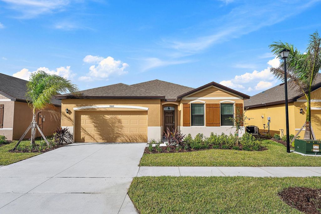 Photo of 9989 SW Triton Way, Port St Lucie, FL 34987 (MLS # R11034092)
