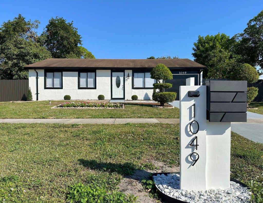 Photo of 1049 Grandview Circle, Royal Palm Beach, FL 33411 (MLS # B26035354)