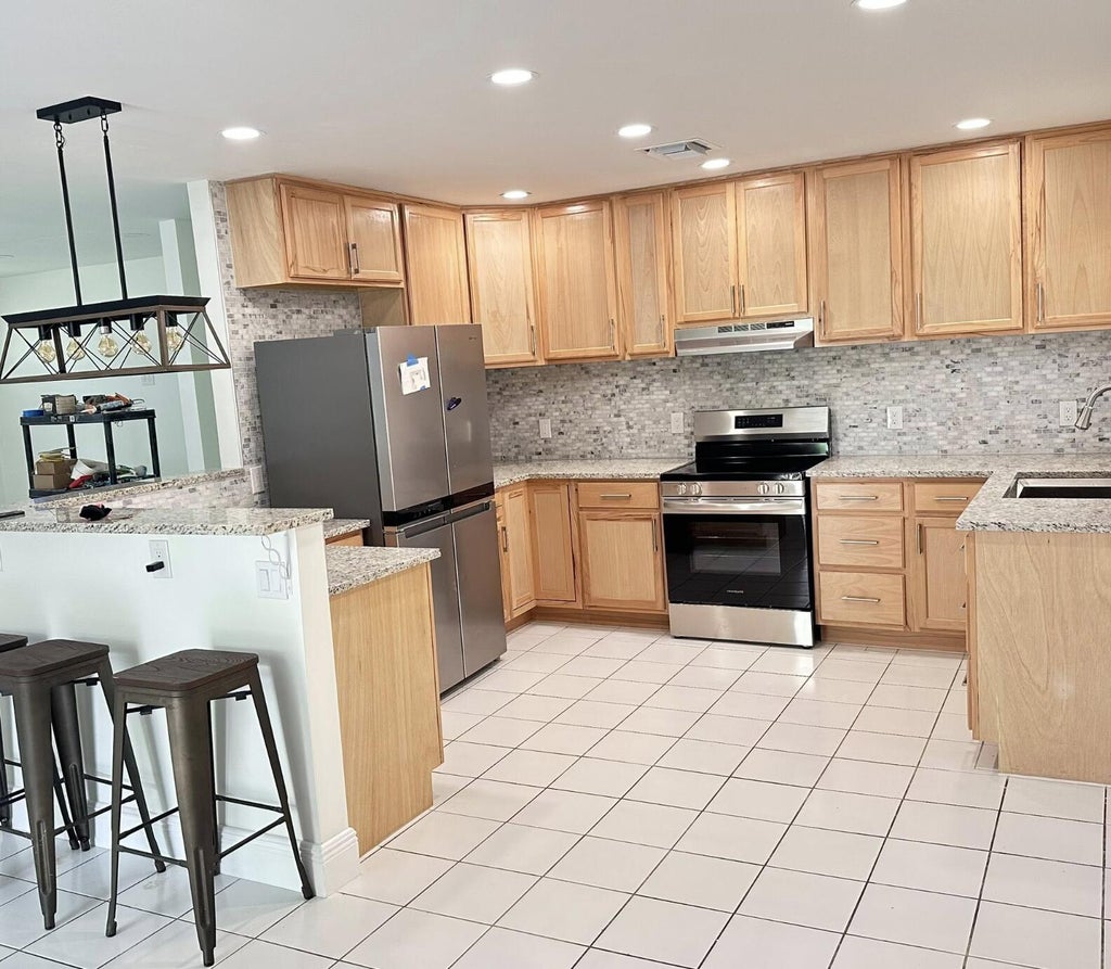 Photo of 117 Yacht View Lane, Fort Pierce, FL 34946 (MLS # B26031981)