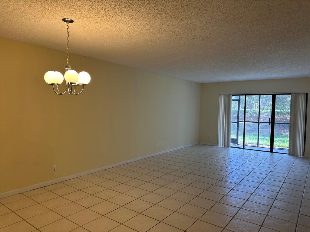 Photo of 310 Racquet Club Road #103, Weston, FL 33326 (MLS # B26042442)