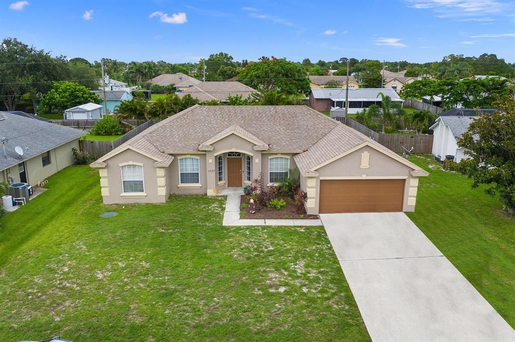 Photo of 1733 SE Mariana Road, Port Saint Lucie, FL 34952 (MLS # R10728831)