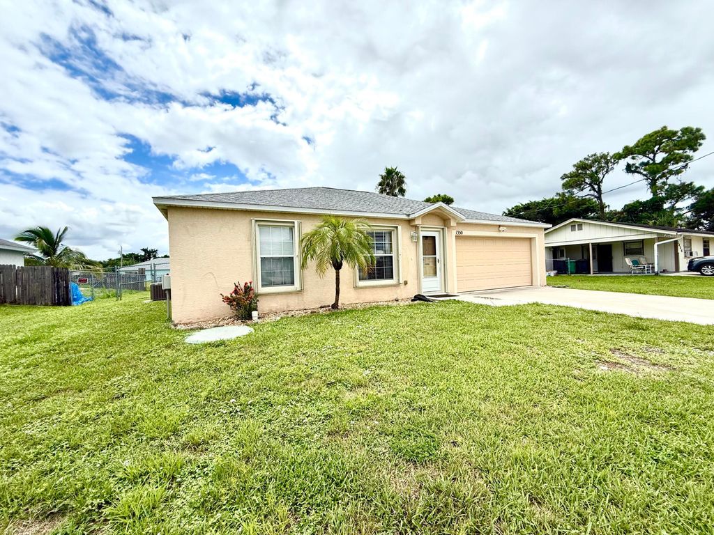 Photo of 1350 SW Granville Avenue, Port Saint Lucie, FL 34953 (MLS # R11120513)
