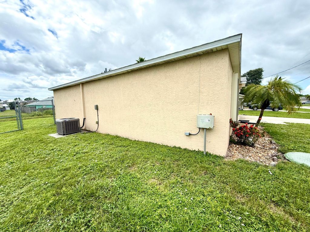 Photo of 1350 SW Granville Avenue, Port Saint Lucie, FL 34953 (MLS # R11120513)