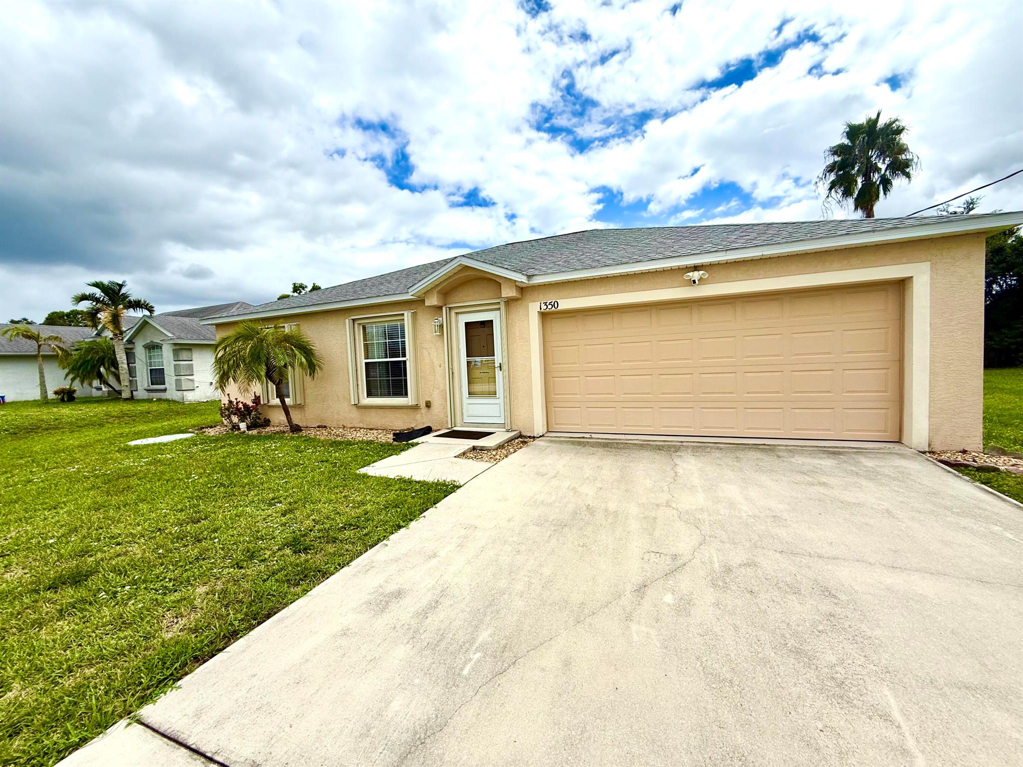 Beautiful 3 Bed, 2 Bath Home in the Heart of Downtown Port Saint Lucie. Charming 3-bedroom, 2-bathroom home with a 2-car garage offers modern upgrades, comfort, and convenience--all in one of the city's most desirable areas. Built in 2008, this well-maintained property includes:New Roof (less than 3 years old, rated for 160 mph winds)New Kitchen Cabinets & CountertopsNew Enclosed Patio with vinyl windows and slab foundationTotal home Generator IncludedFully Fenced Yard with 6-foot privacy fence3 Spacious BedroomsWasher & Dryer includedMicrowave (less than 1 year old)