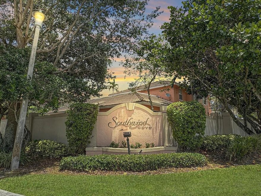 Gorgeous 4BR/2.5BA corner townhome on enlarged lot located in Southwind Cove a gated, peaceful, family and pet-friendly neighborhood. This spacious home offers natural light. The first floor features ceramic tiles, a large family/great room, half bath, and laundry room, upgraded solid surface countertops, stainless steel appliances throughout the kitchen, and a spacious eating area. 4 bedrooms and two full bathrooms on the second floor with Berber carpeting throughout. Master bedroom boasts vaulted ceilings and a spacious walk-in closet. 1 car garage, with a 4 car driveway. Beautiful backyard and extended patio, perfect for relaxing and entertaining with views of the lake, pool, and playground. Located minutes from Sawgrass Mills Mall and easy access to major highways.  Newer A/C system, new roof installed in 2025. Low HOA fees of $255/month which includes alarm monitoring and two heated pools. Walking distance to Cypress Preserve and Oak Hammock Parks. FHA/VA approved.