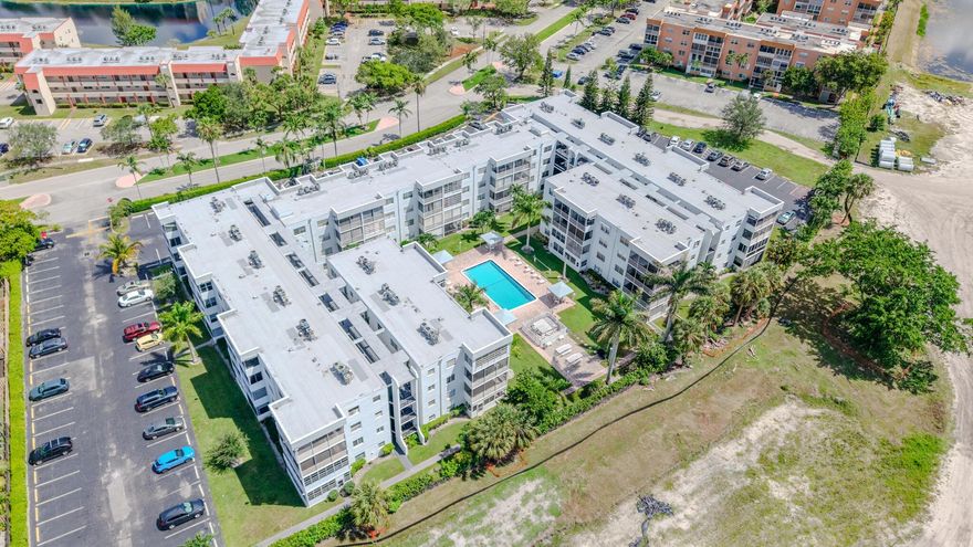 Spacious 55+ condo with 2 en-suites. Fully upgraded  bathroom and open-concept kitchen. The primary en-suite has large walk-in closet. Both bathrooms have walk-in showers. Laundry room on each floor. The enclosed balcony overlook the pool. Walking distance to shopping, dinning, and transportation. Community has a tennis court. Assigned parking 138 is at the building entrance. This is a Must see!