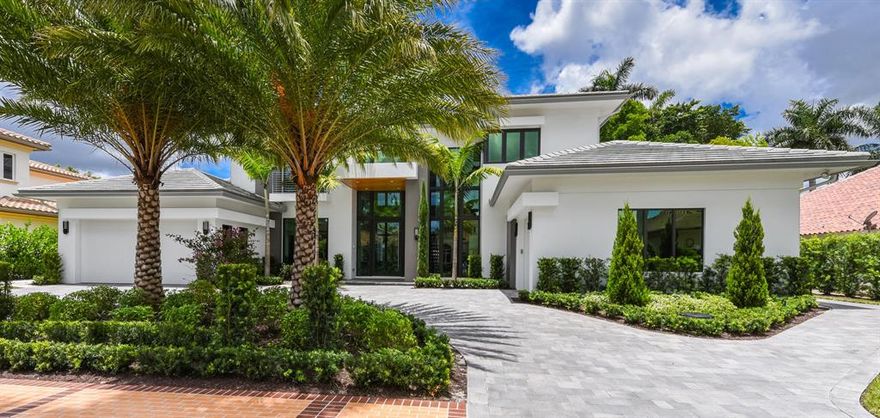 Luxury and sophistication define this NEW Construction contemporary style estate being offered fully furnished. This strikingly elegant residence, with over 6300 sq ft of living area features magnificent architecture and exquisite custom finishes throughout. The grand entrance foyer with floating signature staircase opens to a centrally located great room with stunning floor to ceiling windows creating the ultimate atmosphere for entertaining or casual relaxation. A stunning glass wine room separates this space from a gourmet chef's kitchen, family room and dining areas. A luxurious master suite features his and her baths and generous closets. Views from the interior overlook sweeping golf course vistas,  a sparkling resort style pool, spa, covered loggia and summer kitchen.