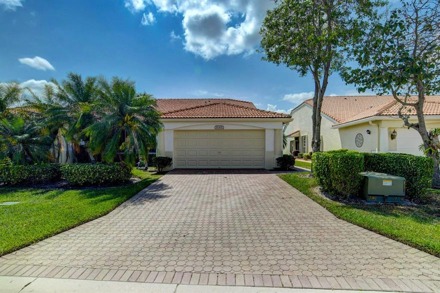 MUST SEE THIS SOUGHT-AFTER LAKEFRONT 2 CAR GARAGE VILLA. THIS IMMACULATE 3/2 HOME IS THE LARGEST MODEL IN FLORAL LAKES RARELY AVAILABLE. SEPARATE LAUNDRY RM, VAULTED CEILINGS, NEW WOOD LAMINATE AND VYNYL FLOORS, PLANTATION SHUTTERS, NEWLY PAINTED, NEW WATER HEATER, ACCORDIAN SHUTTERS. AN OVERSIZE KITCHEN WITH BREAKFAST AREA, STAINLESS STEEL APPLIANCES,CORIAN COUNTERS/42''CABINETS. THE MASTER SUITE WITH WALK-IN-CLOSET AND MASTER BATH WITH SEPARATE SHOWER AND SAFE STEP WALK-IN SPA TUB!! ENJOY THE LAKE VIEW FROM AN ENCLOSED,CERAMIC TILED PATIO!  THIS ACTIVE 55+COMMUNITY INCLUDES A RENOVATED CLUBHOUSE,LIBRARY/CARD ROOM,EXERCISE RM,BILLIARDS,2POOLS,HOT TUB,TENNIS,PICKLEBALL,SHUFFLEBOARD,BOCCE BALL,CRAFTS,ETC. SOCIAL DIRECTOR AND MANAGER ON SITE! LOW HOA FEES AND INTERNET INCLUDED! PET FRIENDLY!