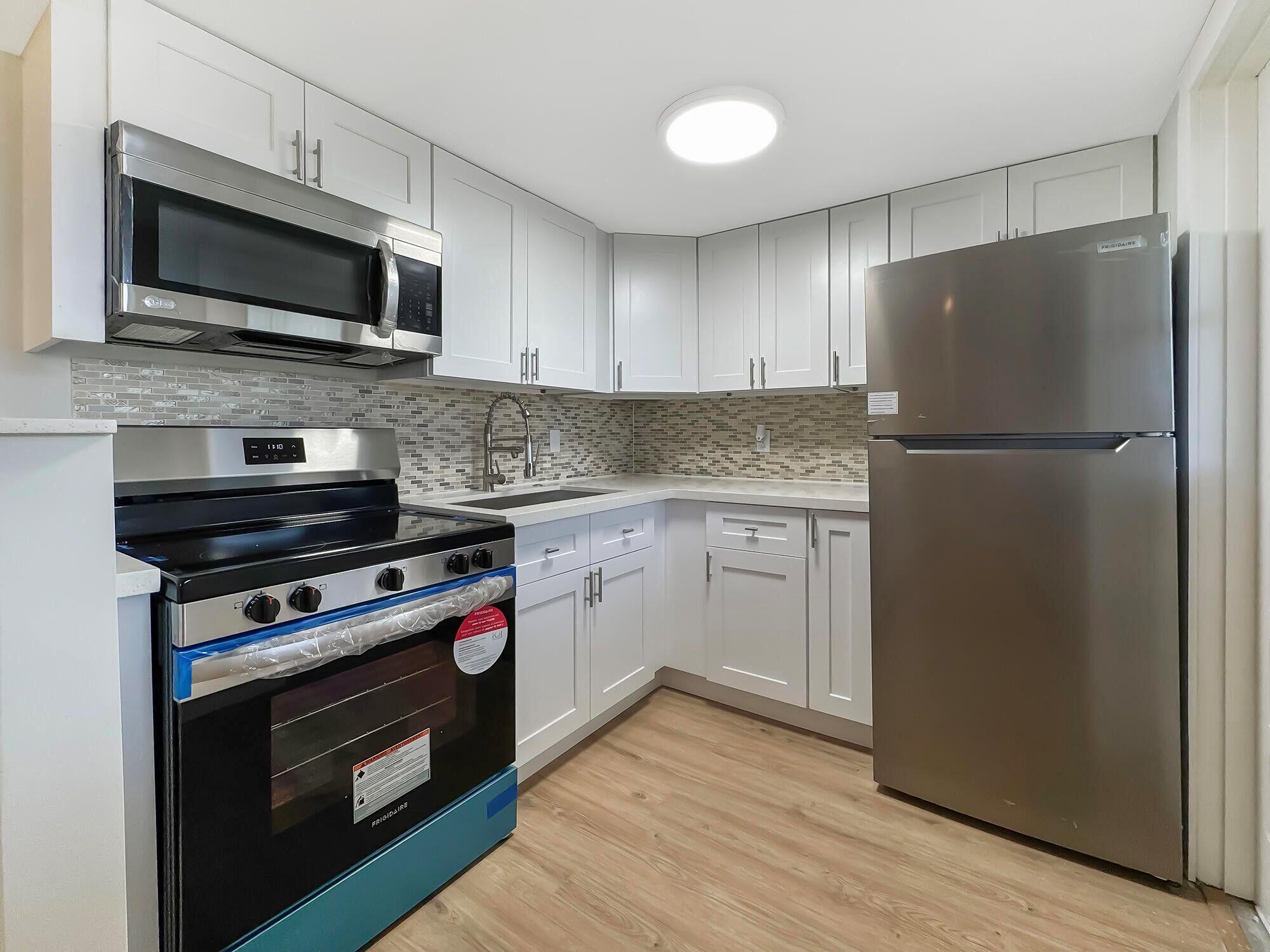 Get ready to fall in LOVE! This JUST RENOVATED one Bedroom, 1.5 Bathroom condo is in the lovely community of Village Royale. The owner spared no expense and completely renovated the entire condo! Brand NEW White Shaker Cabinetry, a MOVEABLE Kitchen Island with Quarts Countertops, All NEW Stainless Steel Appliances! New LVP Flooring, Paint, Bathroom Vanities! You can't ask for a more beautiful condo! AVAILABLE IMMEDIATELY and Tucked away in the sweet 55+ adult community of Village Royale, away from the hustle and bustle yet close enough to everything you could possibly need. Just minutes to breathtaking South Florida beaches, shopping, dining, Palm Beach International Airport (PBI) or Fort Lauderdale Airport (FLL).Sorry, no pets, per the association. 700 credit score required.