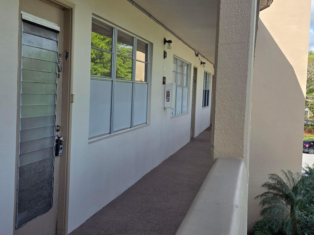 Photo of 2301 Lucaya Lane #E3, Coconut Creek, FL 33066 (MLS # B26008746)