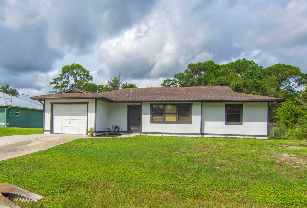 Photo of 5717 BIRCH Drive, Fort Pierce, FL 34982 (MLS # B26080288)