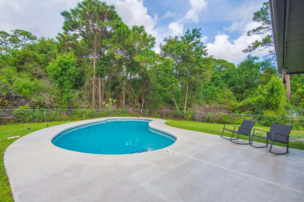 Photo of 5717 BIRCH Drive, Fort Pierce, FL 34982 (MLS # B26080288)