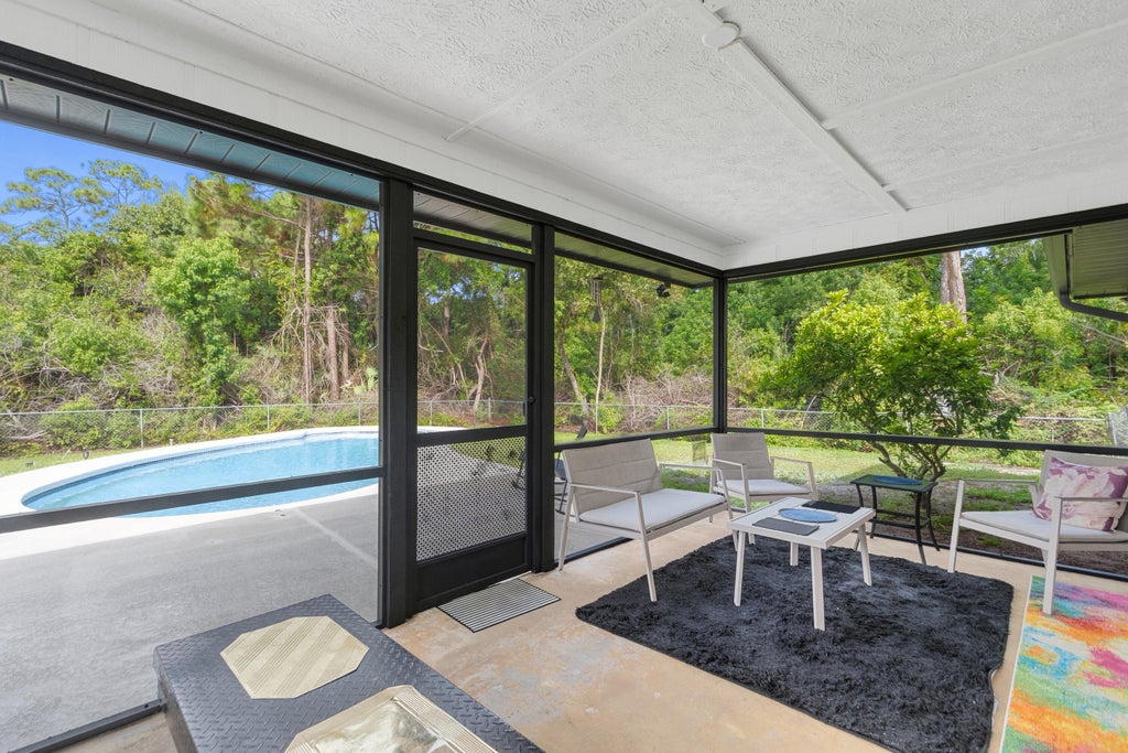 Photo of 5717 BIRCH Drive, Fort Pierce, FL 34982 (MLS # B26080288)